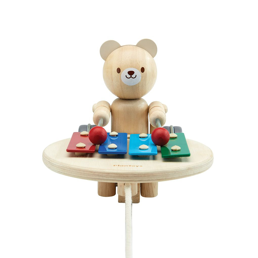 PlanToys Pull Along Musical Bear wooden toy ของเล่นไม้แปลนทอยส์ หมีน้อยนักดนตรีลากจูง ประเภทผลักและลากจูง สำหรับอายุ 12 เดือนขึ้นไป