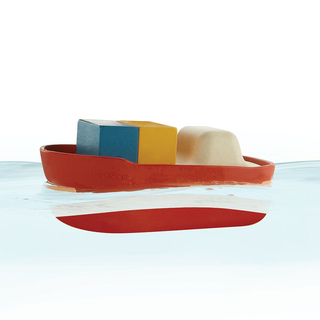 PlanToys red Cargo Ship wooden toy ของเล่นไม้แปลนทอยส์ เรือขนส่งสินค้า ประเภทของเล่นในน้ำ สำหรับอายุ 2 ปีขึ้นไป